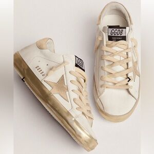 Golden Goose White and Gold Athletic Shoes